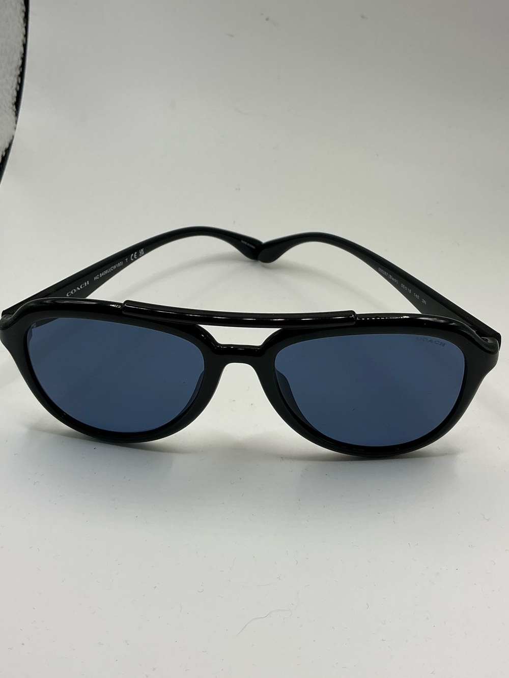 Coach new Women’s Black Sunglasses with Blue Lenses no case